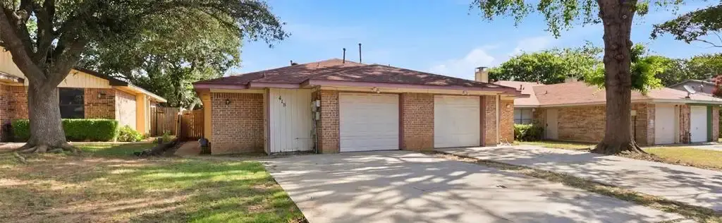 one story duplex in Denton County, TX